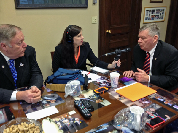 APRN's Lori Townsend speaks with House Speaker Mike Chenault and Senate President Charlie Huggins. (Photo by Annie Feidt, APRN)