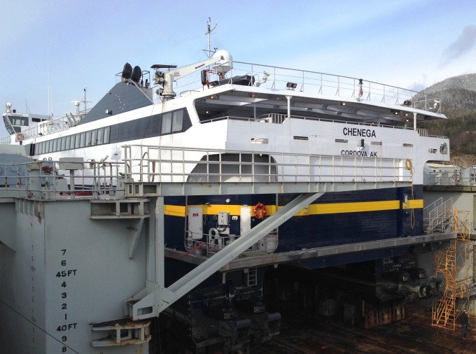 The fast ferry Chenega is up on blocks for repairs and maintenance at the Ketchikan Shipyard Feb. 21, 2014. The Alaska Marine Highway, roads, air[ports and other transportation projects could get a funding boost under Legislation moving in the state House. (Ed Schoenfeld/CoastAlaska News)