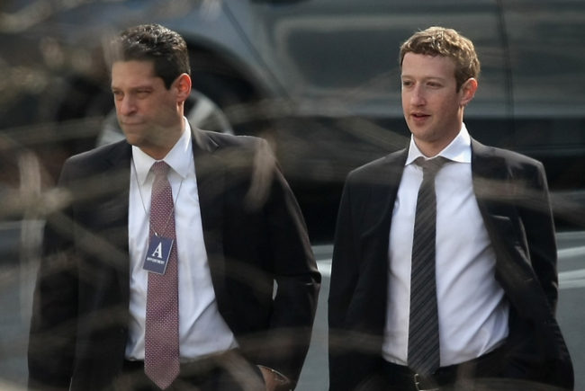 Facebook CEO Mark Zuckerberg, right, arrives at the White House for an Oval Office meeting with President Obama on Friday in Washington, DC. Alex Wong/Getty Images