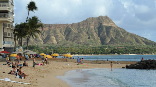 Waikiki Beach in Honolulu, with Diamond Head in the background. State lawmakers are vowing to get rid of a provision in Hawaiian law that allows law enforcement officers to have sex with prostitutes if doing so is within the scope of their duties. Robyn Beck /AFP/Getty Images