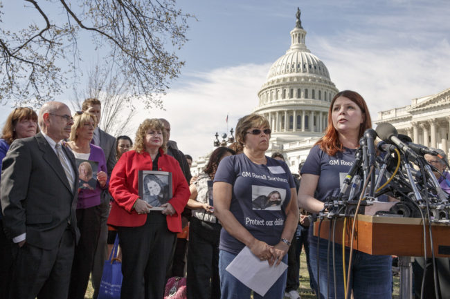 Laura Christian, far right, talks about how her birth daughter Amber Marie Rose was killed on July 29, 2005, in a car crash that investigators determined was linked to a defective ignition switch. J. Scott Applewhite/AP
