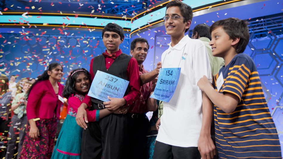 Ansun Sujoe, of Fort Worth, Texas, and Sriram Hathwar, of Painted Post, N.Y., were named co-champions of the 2014 Scripps National Spelling Bee Thursday night. Their siblings helped them celebrate the first shared title since 1952. Manuel Balce Ceneta/AP