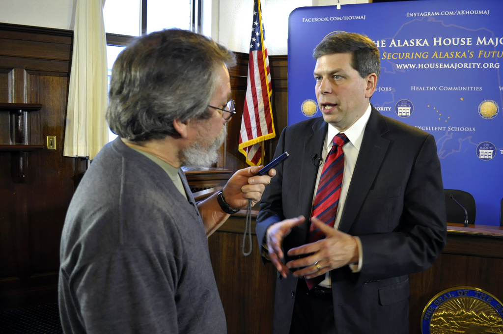 Reporter Bob Tkacz interviews U.S. Sen. Mark Begich following the senator’s annual address to the Alaska Legislature, March 3, 2014. (Photo by Skip Gray/Gavel Alaska)