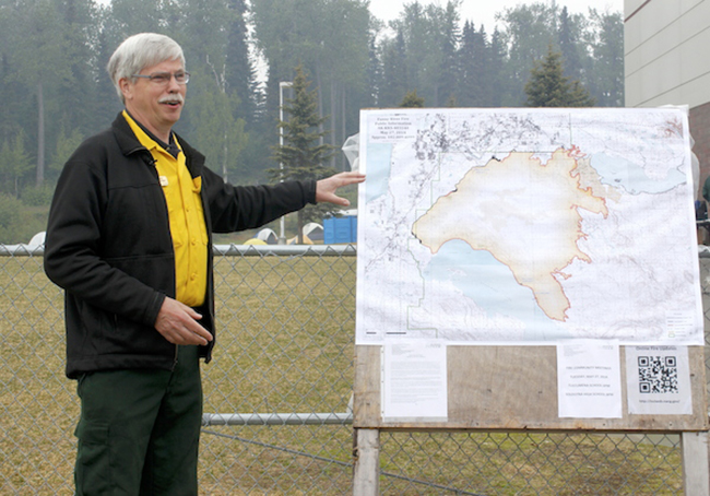 Public Information Officer Jim Schwarber briefs the media about the Funny Rover fire on Tuesday morning. (Photo by Josh Edge/APRN)
