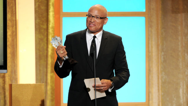 Larry Wilmore accepts the best talk show award for "The Daily Show with Jon Stewart" at the Critics' Choice Television Awards in June 2013. Frank Micelotta/Invision/AP