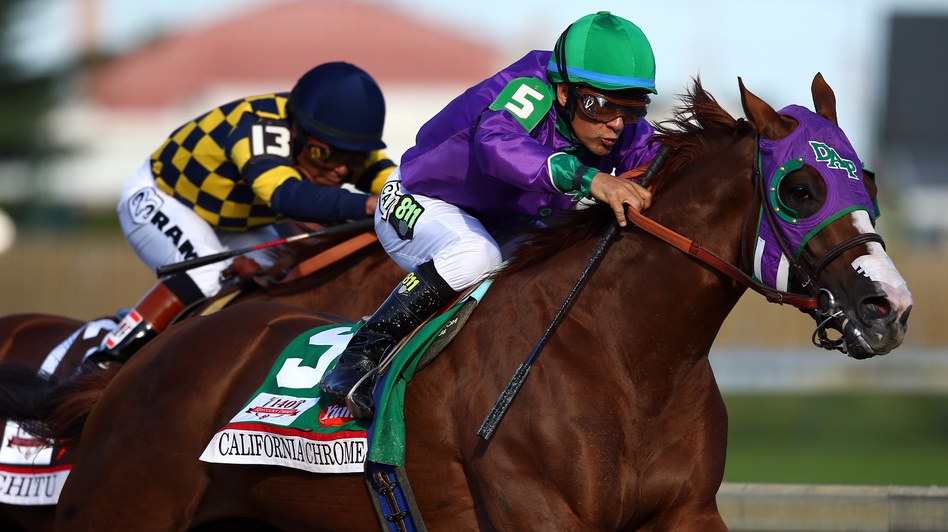 California Chrome, ridden by Victor Espinoza, comes out of the fourth turn en route to winning the 140th running of the Kentucky Derby at Churchill Downs on Saturday. Andy Lyons/Getty Images