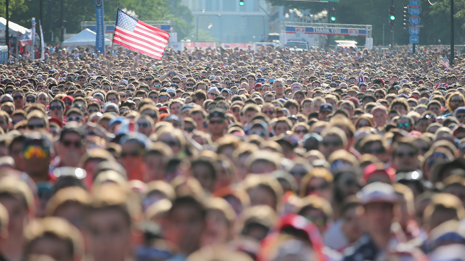 Fans gather in Chicago's Grant Park to watch the U.S. play Portugal Sunday — a game that set a new ratings record for soccer on ESPN. Scott Olson/Getty Images