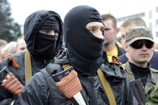 Pro-Russian militants take the military oath of allegiance to the so-called People's Republik of Donetsk during the ceremony in the eastern Ukrainian city of Donetsk on Saturday. Alexander Khudoteply /AFP/Getty Images