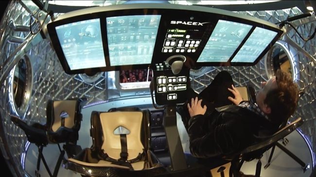 SpaceX founder Elon Musk briefly climbed inside the capsule to show off its flat panel cockpit. SpaceX