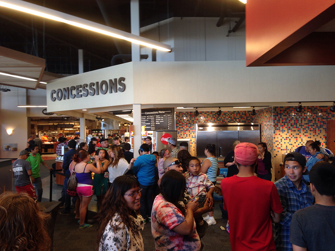 The customer line snaked its way from the entrance to the concession stand. (Photo by Charles Enoch/KYUK)