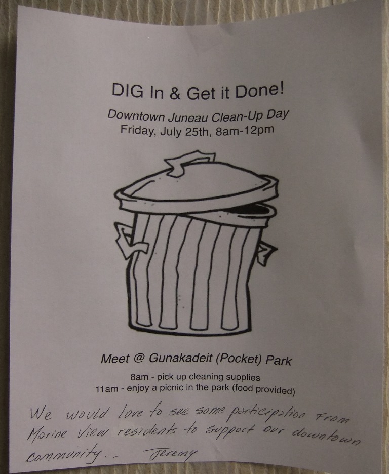 Small poster in the downtown Marine View building announces the cleanup. (Photo by Rosemarie Alexander/KTOO)