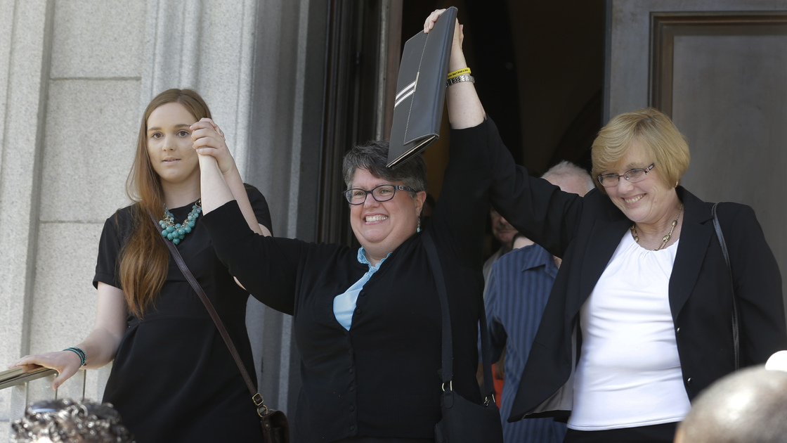 Plantiffs in the suit over Virginia's ban on gay marriage, Emily Schall-Townley (from left), Carol Schall and Mary Townley, after a hearing on May 13. Steve Helber/AP