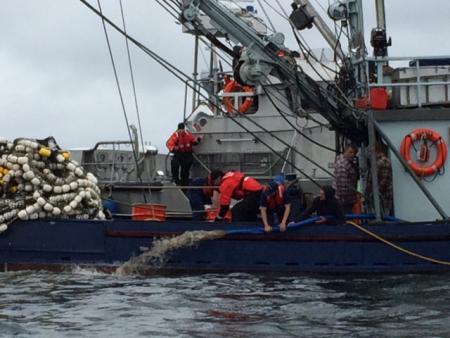 Coast Guard Station Ketchikan boarding team members help the crew of the F/V Vernon dewater their engine room near Ketchikan on Friday. (Photo courtesy U.S. Coast Guard Station Ketchikan)