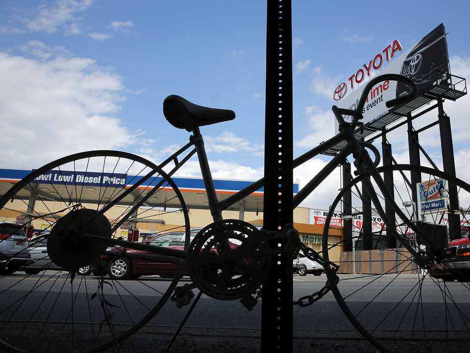 A "Ghost Bike", which are used to signify a fatality involving a bicycle, is viewed along a busy street on May 30 in the Brooklyn borough of New York City. Spencer Platt/Getty Images