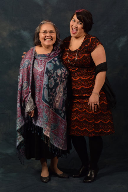 Sandy Demmert and Barbara Blake. Demmert's shawl is from Lisa Davidson's Boutique. Blake decided on her dress from the Alaska General Store because, “I’ve been into Downton Abbey lately and so I was like, this is kind of like that style." (Photo by Skip Gray/KTOO)