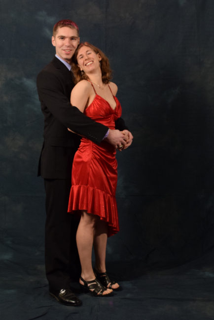 James and Crystal Dooley. "I bought this dress in 2007," said Crystal. "He and I went to the Coast Guard academy together and we had a formal dance at a Newport castle. We were boyfriend and girlfriend. Same dress; we’ve been married seven years. I think it looks better now." (Photo by Skip Gray/KTOO)