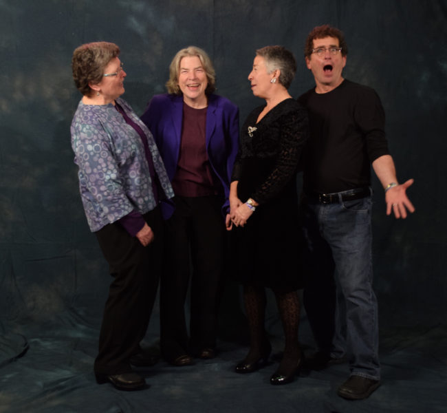 Martha Murray, Jennifer Shapland, Jetta Whittaker, Rob Steedle. Murray and Shapland are wearing the same outfits they wore to their wedding two years ago. Whittaker's earrings were brand new during Steve Cowper's inaugural ball. (Photo by Skip Gray/KTOO)