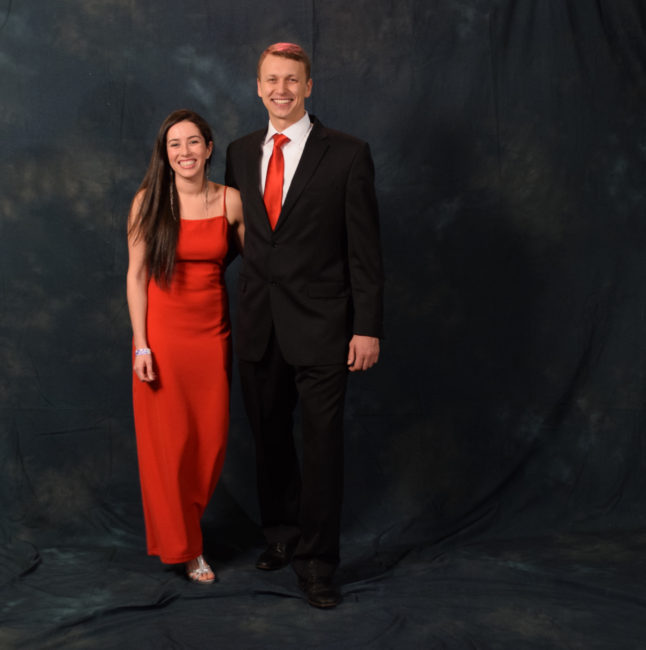 Danielle Zimmerman and Dimitri Stepenoff. Zimmerman's red dress once belonged to her mother. Stepenoff's shoes are by Johnston & Murphy. (Photo by Skip Gray/KTOO)