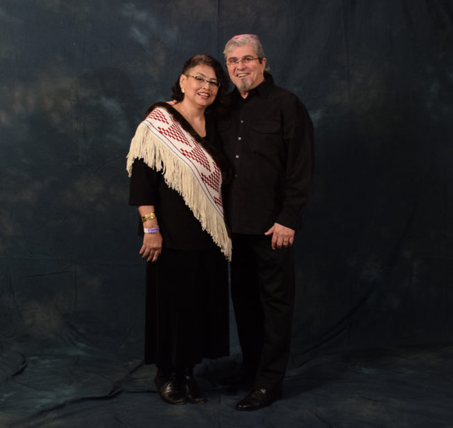 Gail Cheney and James Franco. Cheney said her Ravenstail sash woven in a flying geese pattern and lined with sea otter fur was a mix of "style and culture." (Photo by Skip Gray/KTOO)