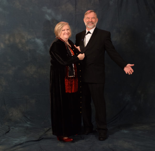 Lori and Virgil Fredenberg. Virgil bought his tux from Alaskan Dames and Gents Consignment Shop. Lori's scarf is designed by Juneau's Stories and Legends Inc. (Photo by Skip Gray/KTOO)