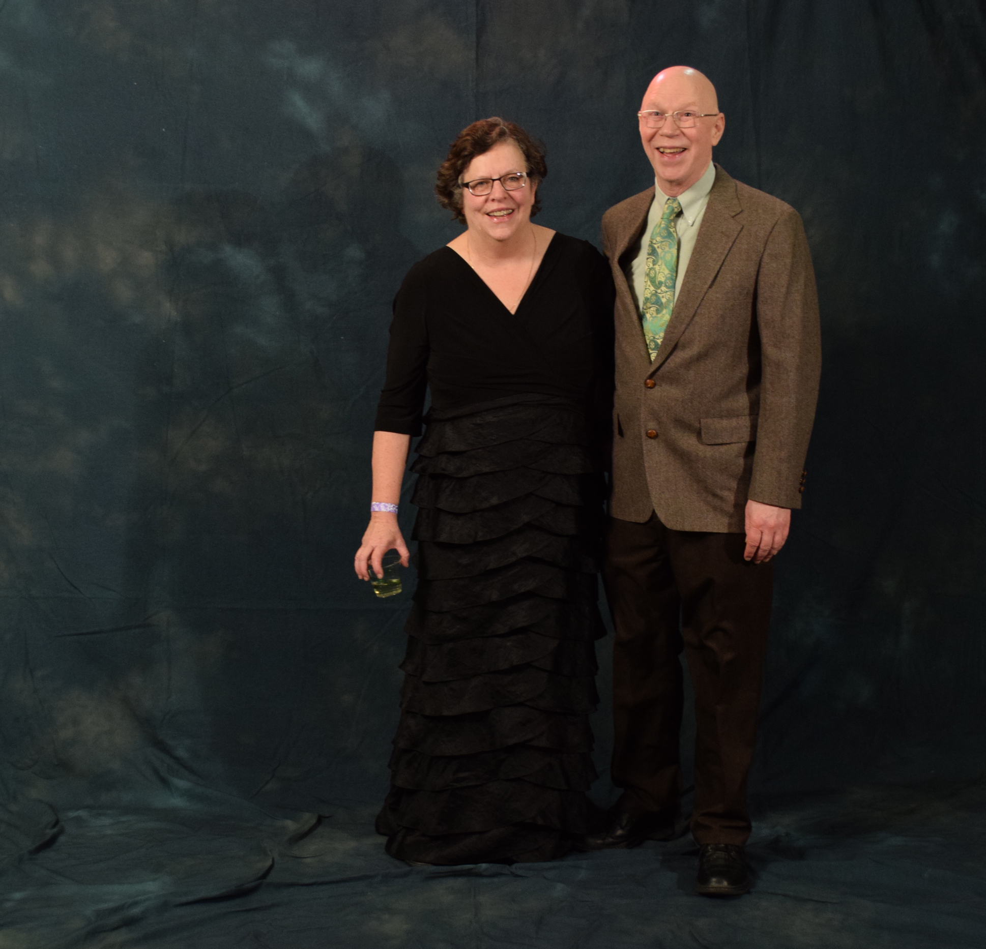Jane Ginter and Bob Coghill. Coghill received his green tie from a Tie of the Month Club. (Photo by Skip Gray/KTOO)