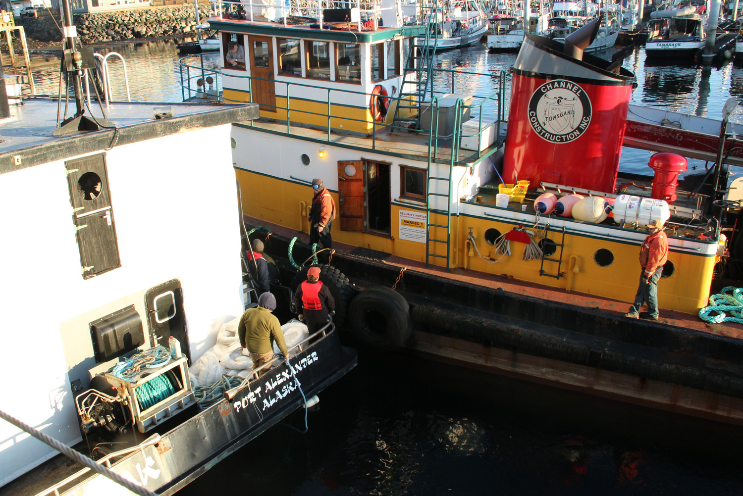 The Eyak bids goodbye to the tugboat Marauder, which brought it into Sitka Channel. (Photo by Rachel Waldholz/KCAW)