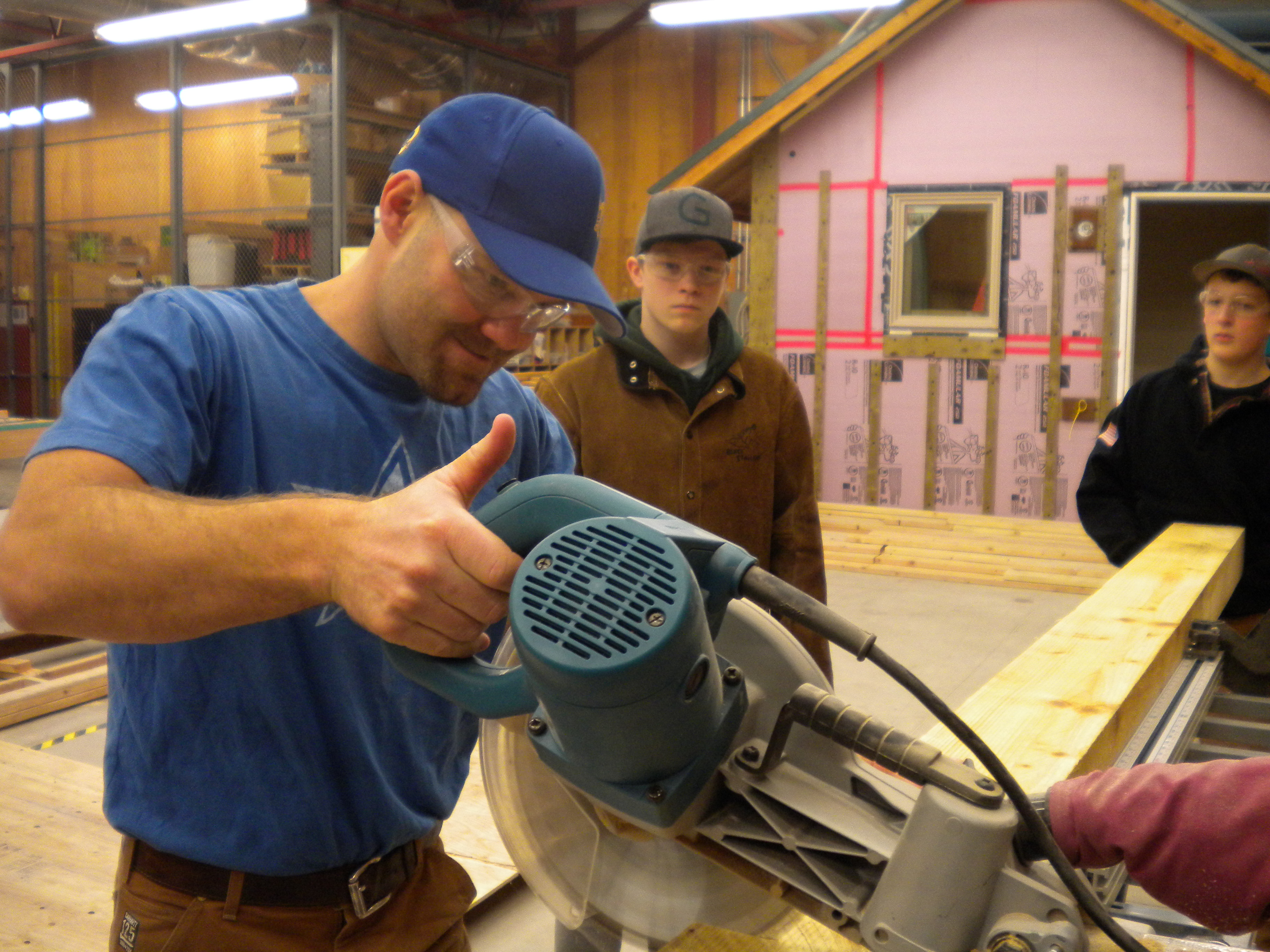 Juneau Douglas High School teacher Andy Bullick brings students to the UAS Technical Education Center a few times a week to work on the mobile greenhouse. (Photo by Kevin Reagan / KTOO)