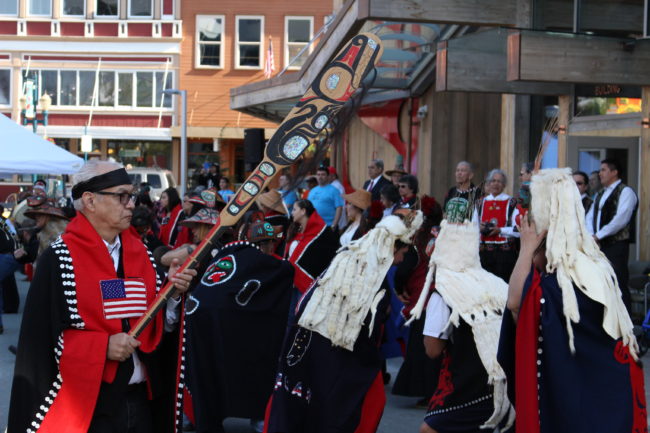 The Aangun Yatx’i dance in their regalia in front of the Walter Soboleff building. (photo by Elizabeth Jenkins/KTOO)
