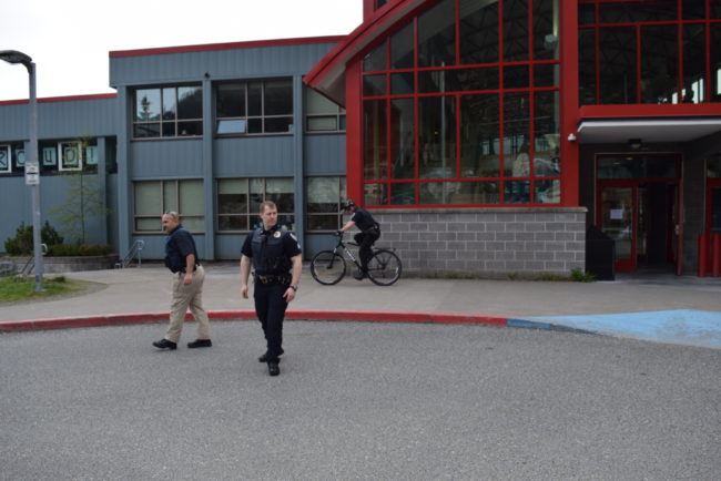 Juneau Police officers made sure Juneau-Douglas High School was secure after a threatening call prompted heightened security at the school for the second time in eight days. (Photo by Casey Kelly/KTOO)