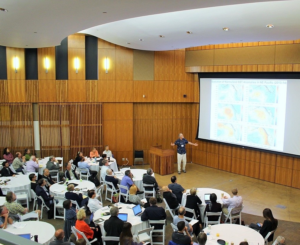 Washington state climatologist Nicholas Bond (on stage) presents his observations on warm sea surface temperatures during a May 2015 conference at Scripps Institution of Oceanography. (Photo courtesy of Southern California Coastal Ocean Observing System)