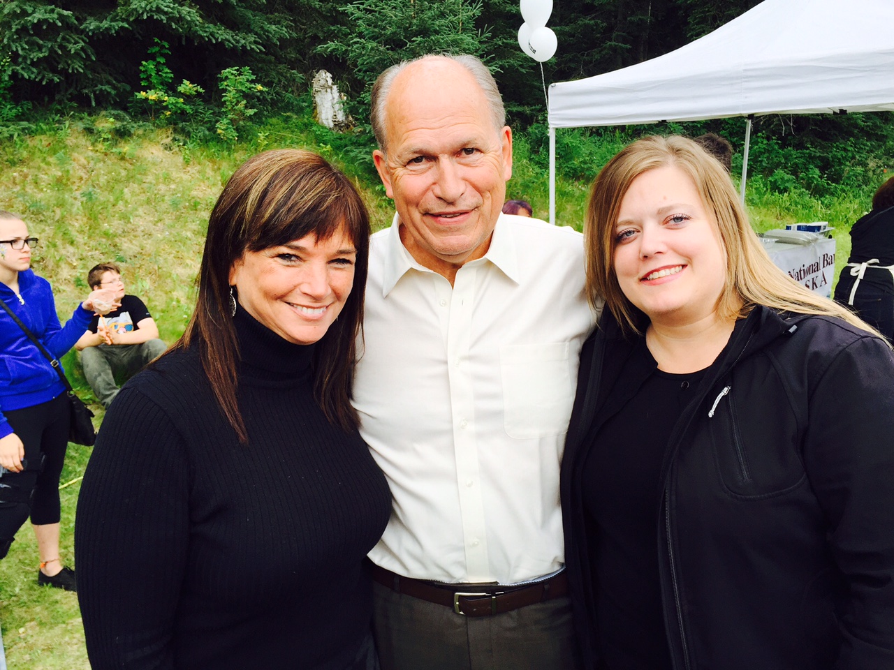 Rep. Charisse Millett (left), Gov. Bill Walker (center) and Rep. Geran Tarr attend an Alaska Flag Day celebration Thursday where Walker signed the Alaska Safe Children's Act. (Photo courtesy of Geran Tarr)