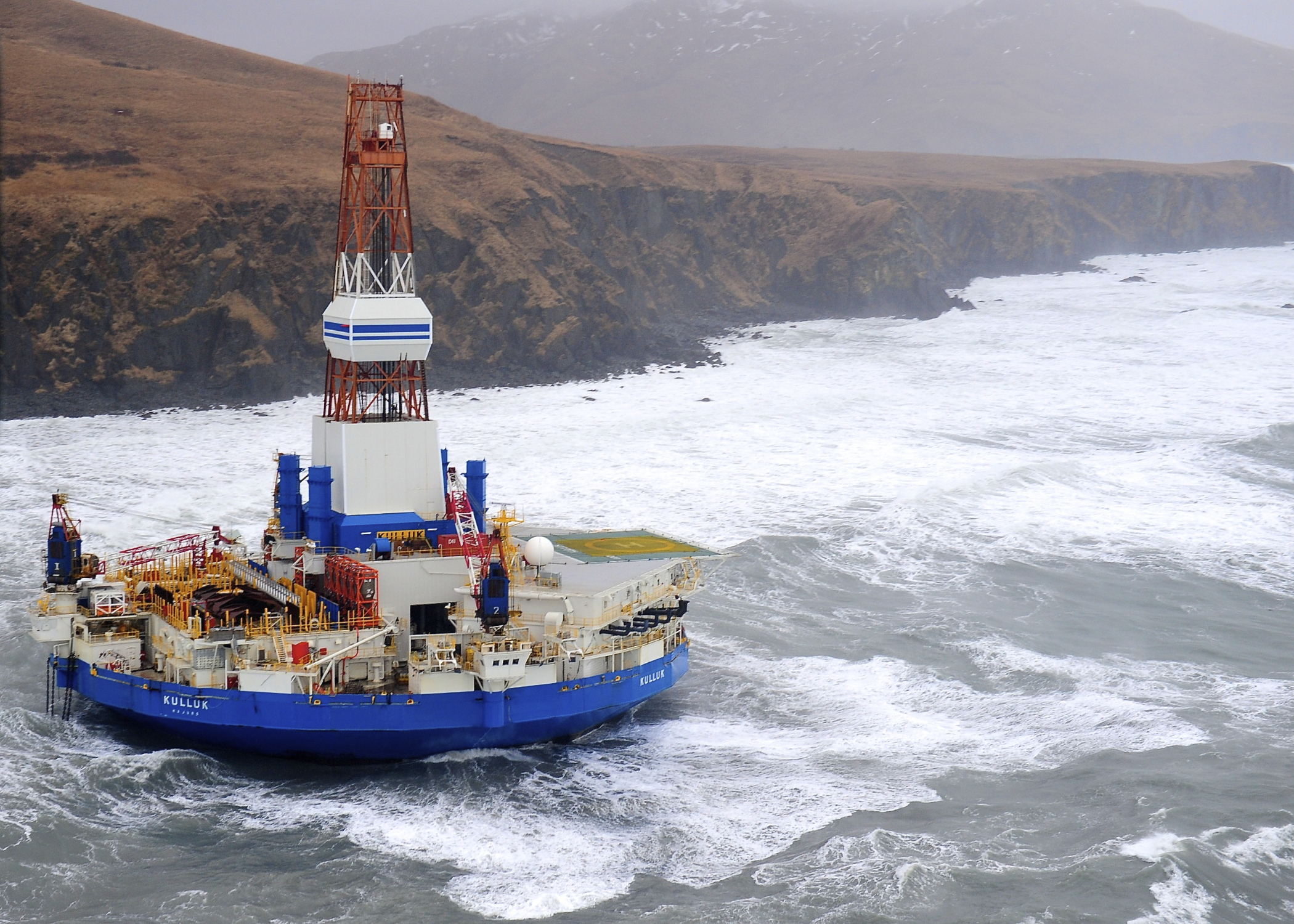 The Kulluk is an Arctic drill rig owned by Royal Dutch Shell. In 2012, the rig ran aground off Sitkalidak Island near Kodiak Island. The highly publicized incident was used by drilling opponents as an example of Shell's lack of qualifications to drill in the Arctic. (Photo by Petty Officer 1st Class Sara Francis/U.S. Coast Guard)