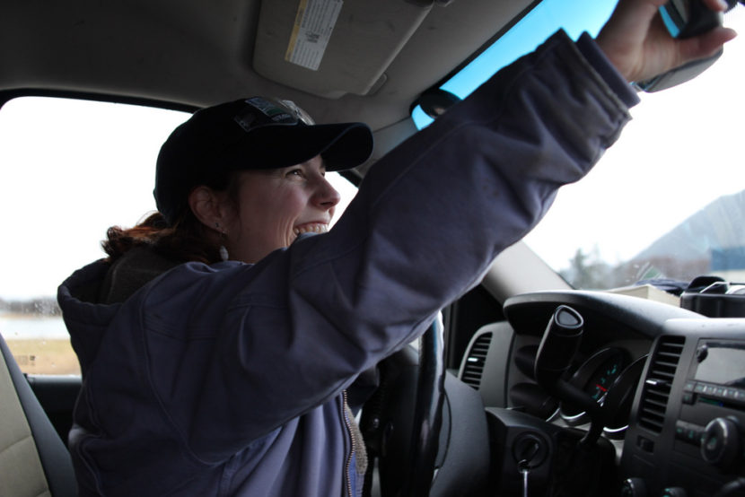 Bauscher enjoys having the runway as her office space. “It’s pretty neat to be able to get to be out here. I feel pretty lucky to have this job,” she said. (Photo by Emily Kwong/KCAW photo)