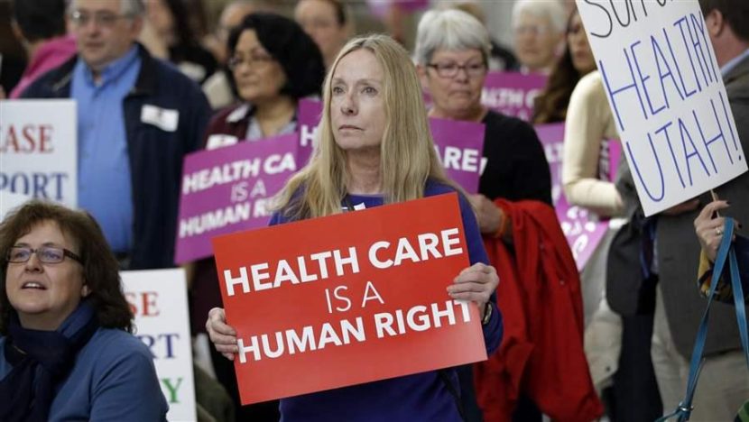 Supporters of Republican Gov. Gary Herbert's Medicaid expansion plan rally at the Utah State Capitol. Legislators rejected his plan last year. This year, Herbert and other proponents of expansion may wait out the presidential election before pushing the issue again. AP