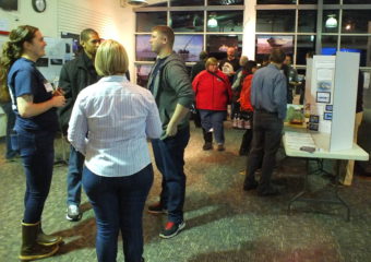 Juneau residents ask questions and check out displays during the Challenger open house. (Photo by Matt Miller/KTOO)