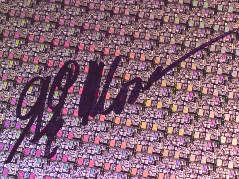 This 2005 silicon wafer with Pentium 4 processors was signed by Gordon Moore for the 40th anniversary of Moore's law. Science & Society Picture Library/Getty Images