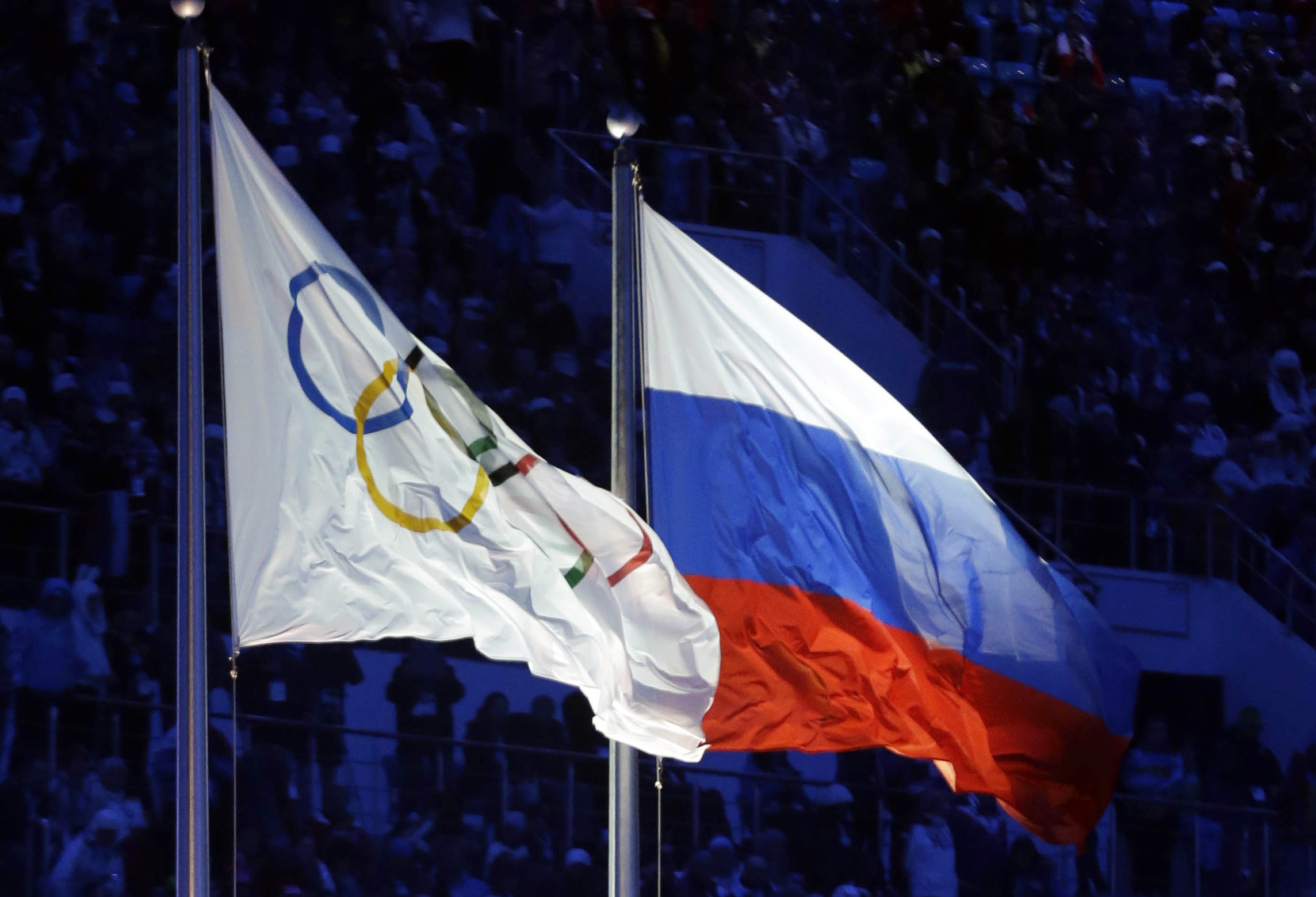 The Russian and the Olympic flags wave during the opening ceremony of the 2014 Winter Olympics in Sochi, Russia.
Patrick Semansky/AP