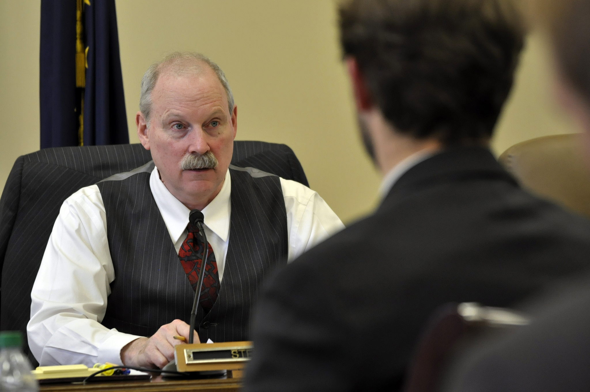 Sen. Bert Stedman reacts to testimony at a Senate Labor and Commerce committee meeting, Feb. 18, 2014. (Photo by Skip Gray/Gavel Alaska)