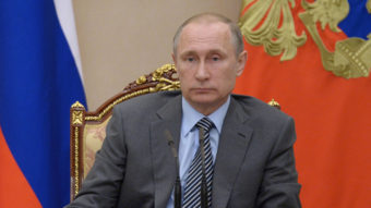 Russian President Vladimir Putin chairs a recent meeting of Russia's Cabinet in the Kremlin. Security experts say Russia is behind the DNC hack. (Photo by The Associated Press)