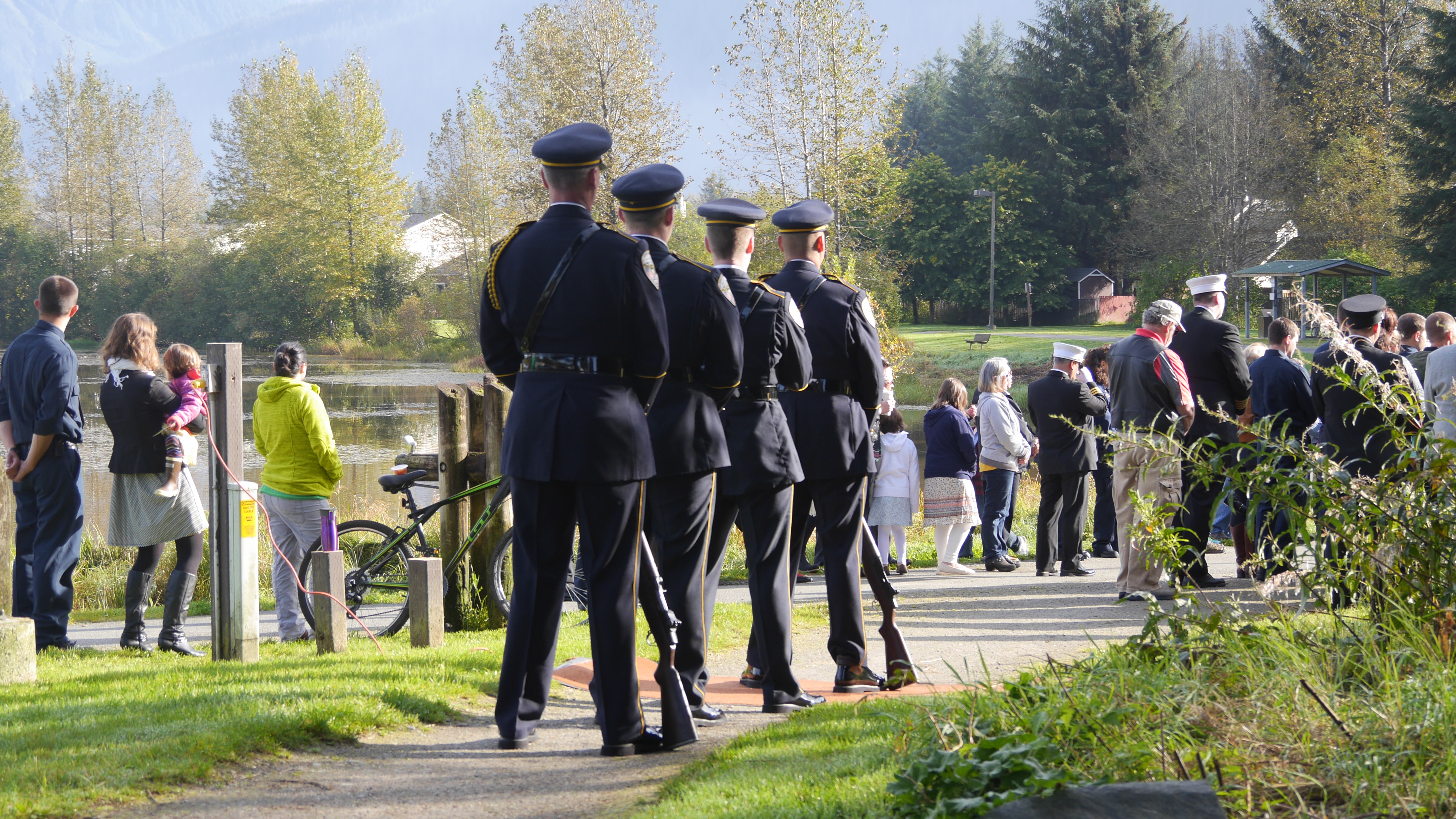 JPD Honor Guard waits to escort the flag to the memorial..