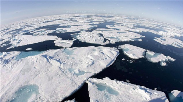 Ice floes float in Baffin Bay between Canada and Greenland above the Arctic circle on July 10, 2008. The seven lowest levels of sea ice cover have all been recorded in the last seven years. (Photo by Jonathan Hayward, Canadian Press.)