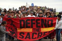The Standing Rock Sioux Tribe says the planned pipeline could contaminate its drinking water and sacred lands. (Phtoo by Robyn Beck /AFP/Getty Images)