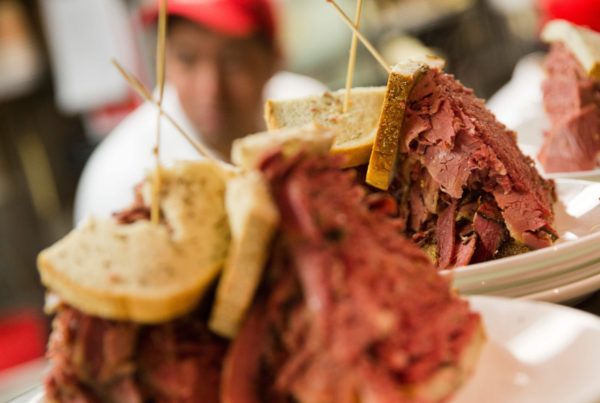 A pastrami sandwich sits on the service counter at the Carnegie Deli in New York. The deli is closing at the end of 2016.