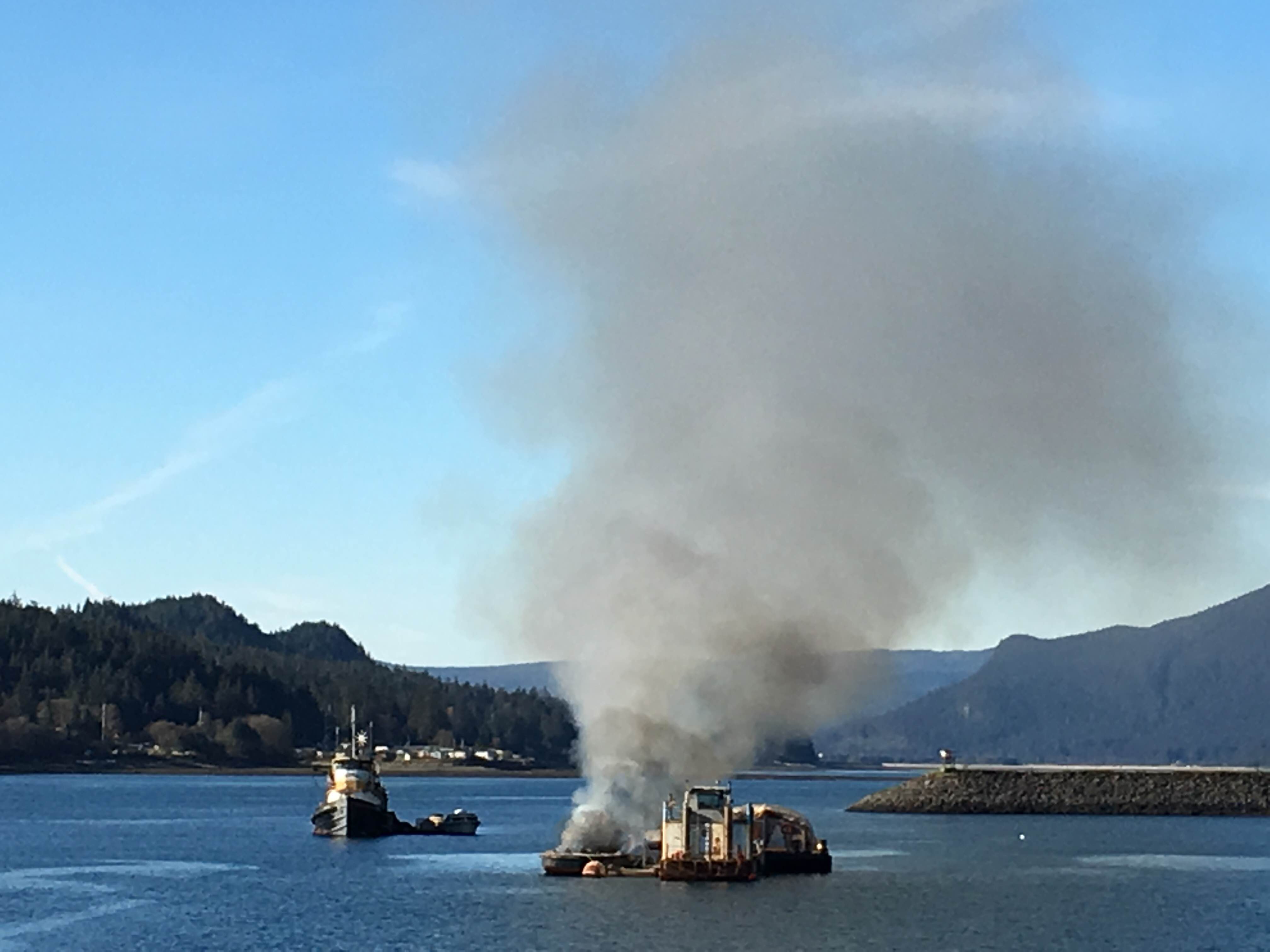 Smoke billows up Gastineau Channel from boat fire
