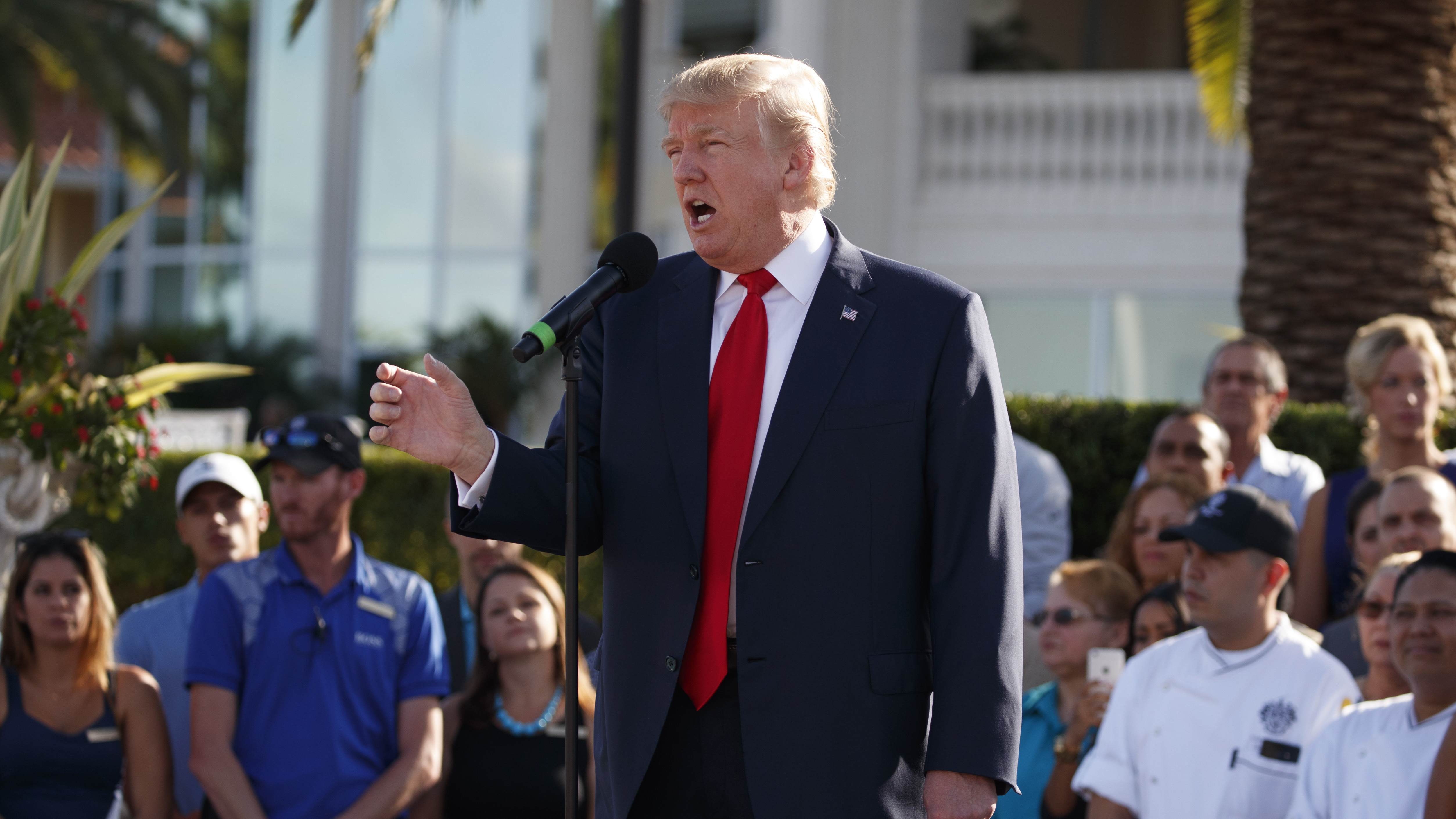 Trump says he will pull back from businesses but offers no details yet
