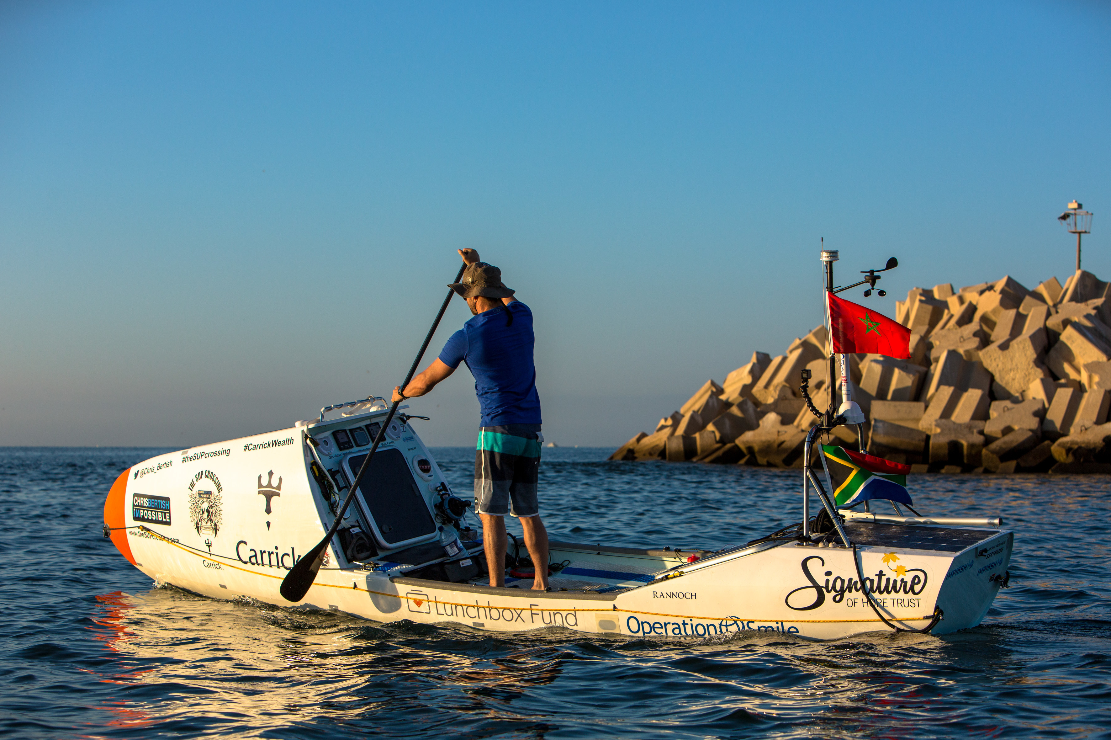 A surfer and his paddleboard embark on a lonely trans-Atlantic voyage