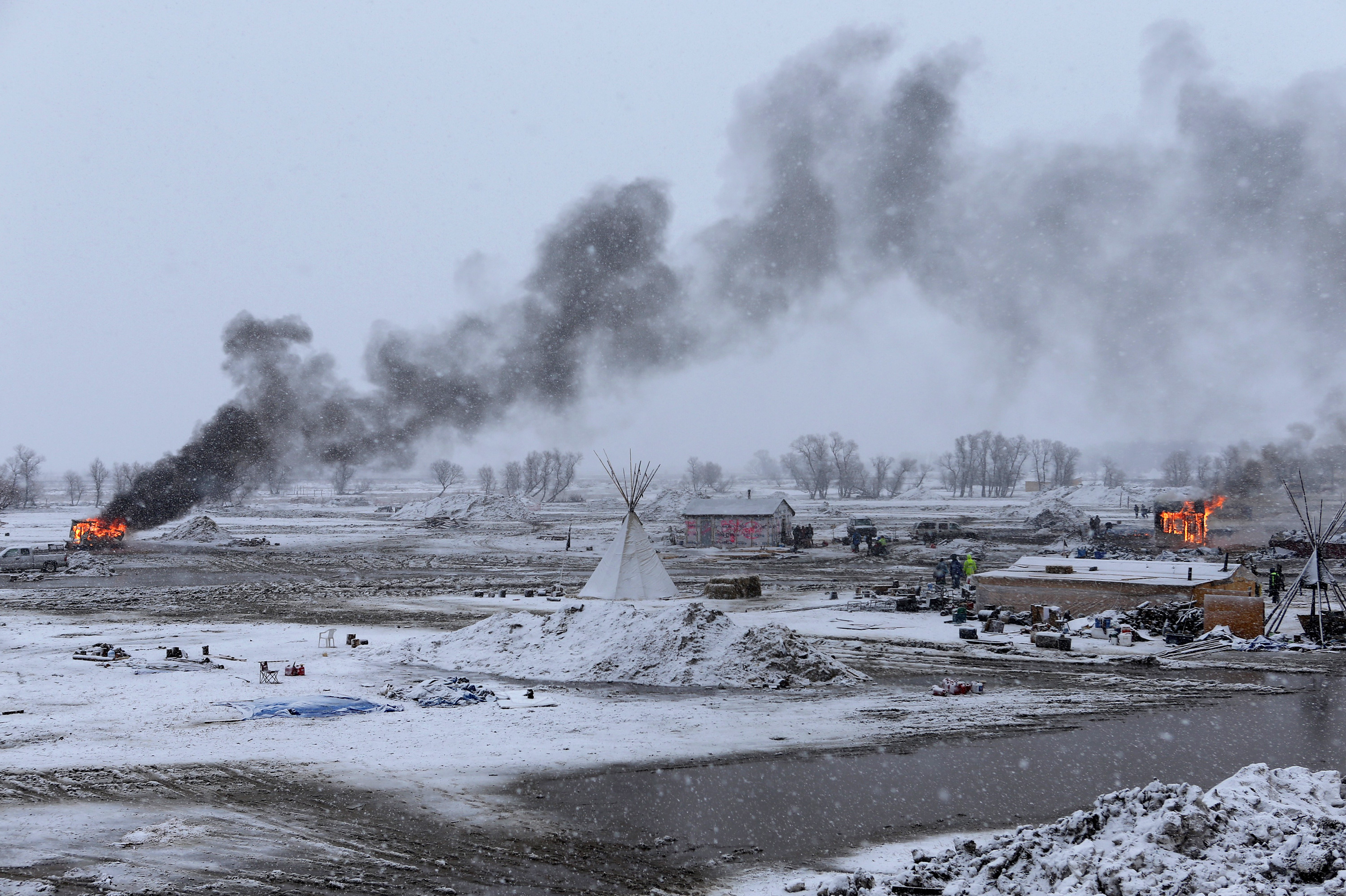 Protesters leave Dakota Access Pipeline area; some stay and are arrested