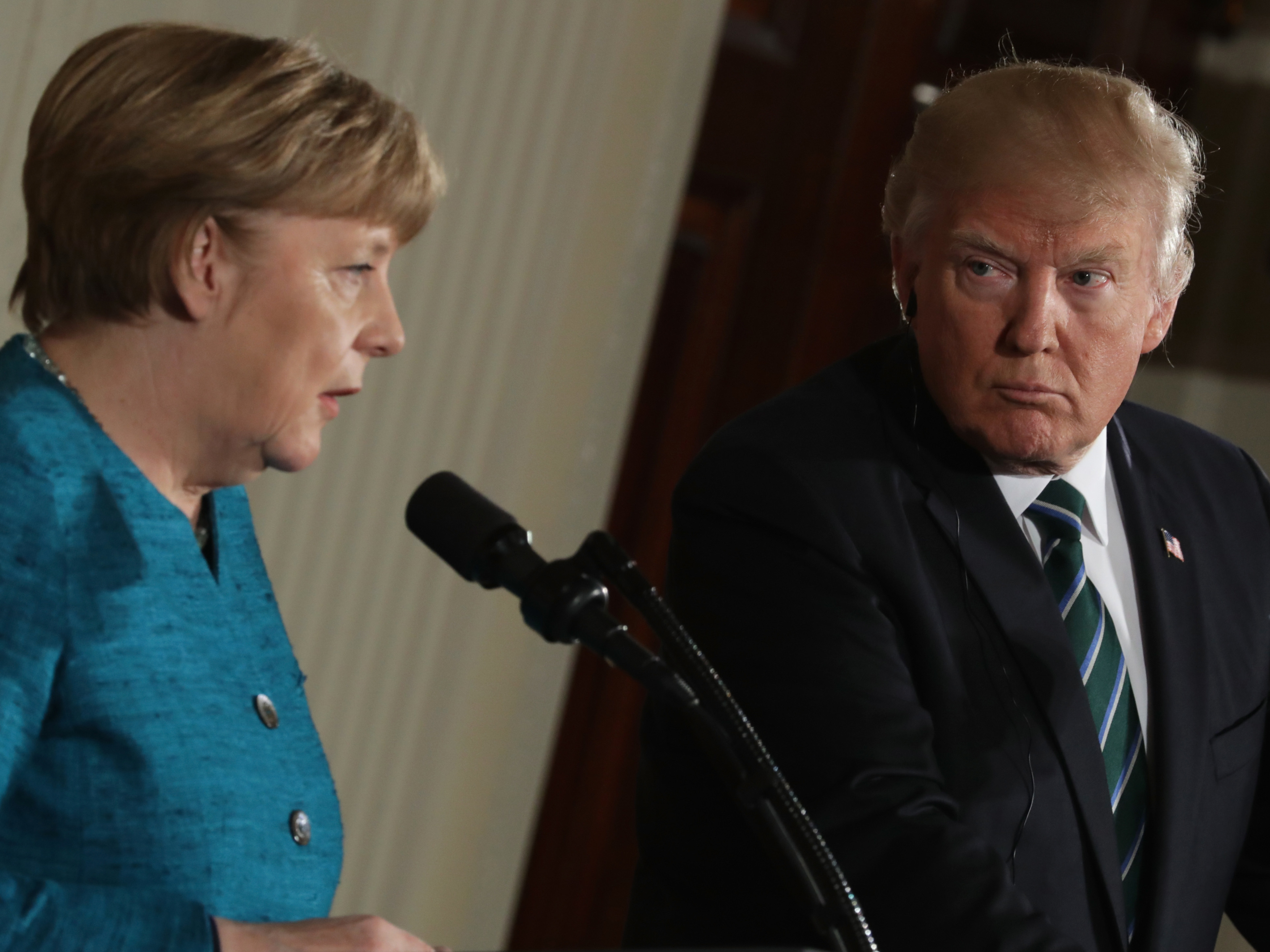 Trump stands by unproven wiretap claim at joint news conference with Merkel