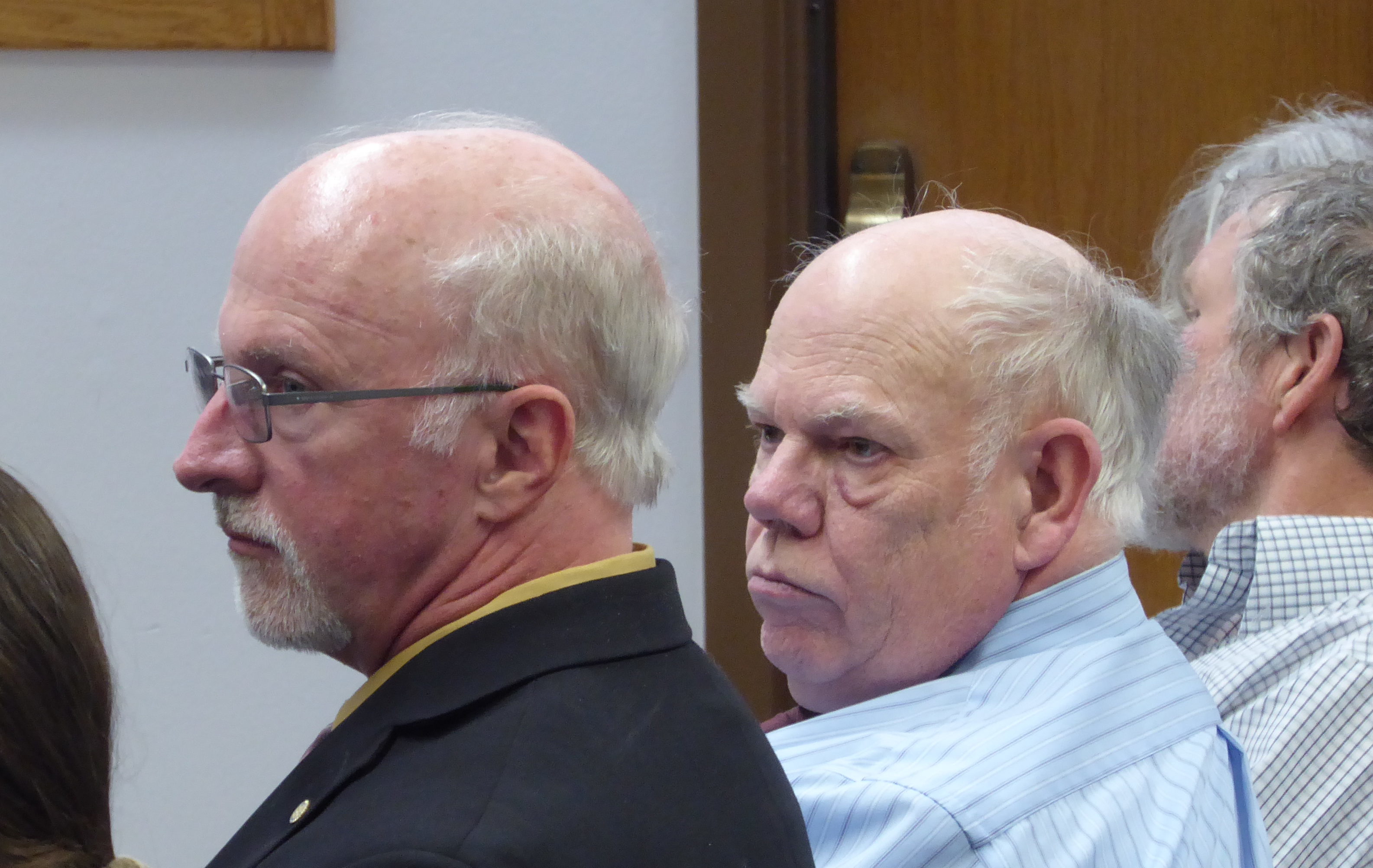 Juneau School District Superintendent Mark Miller, left, and Director of Administrative Services David Means at the Juneau Assembly special meeting on Wednesday, April 26, 2017.