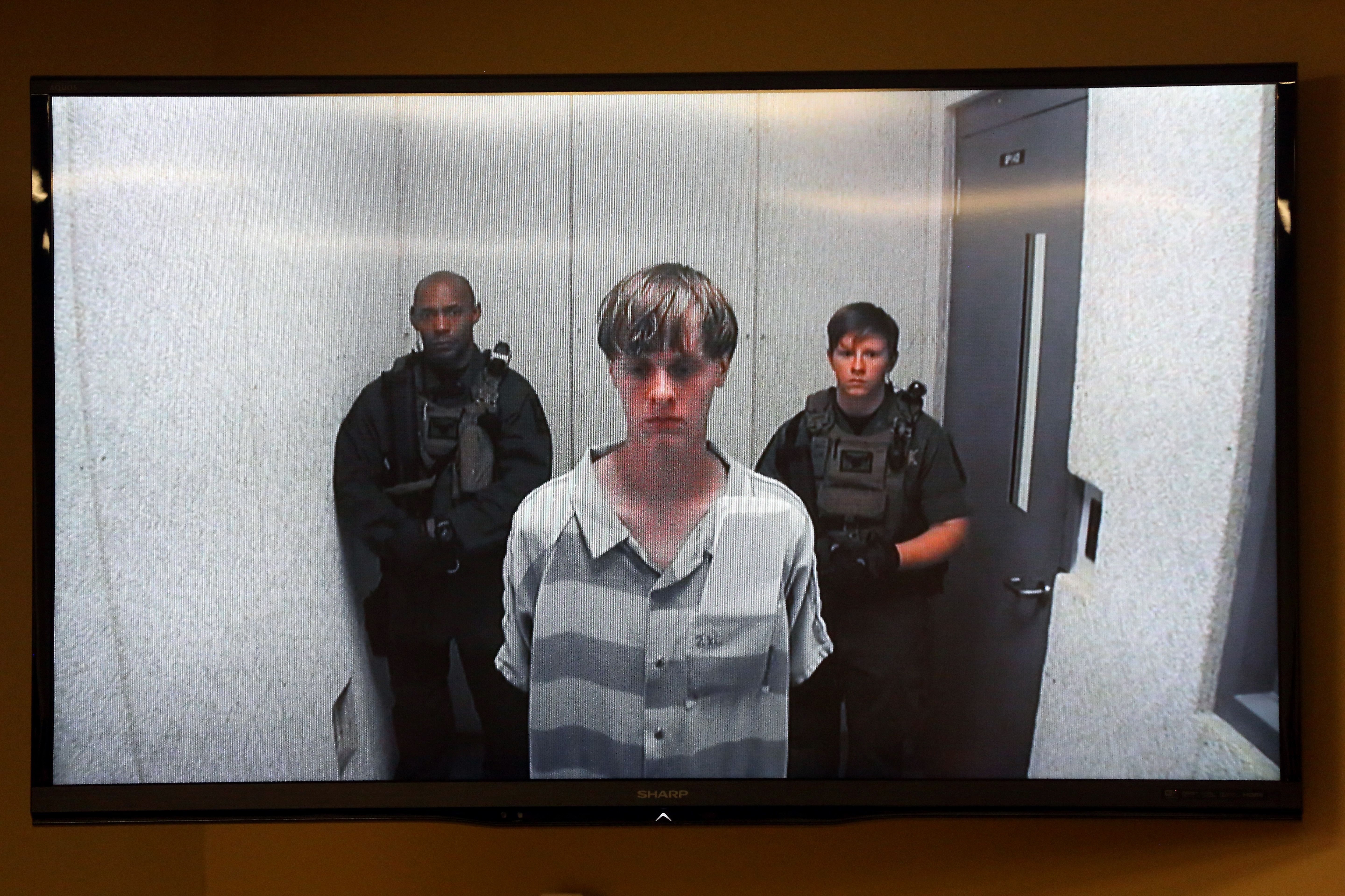 Dylann Roof pleads guilty to state murder charges for Charleston church attack
